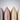 A row of ZILK mulberry silk pillowcases in charcoal, silver, pink, champagne, ivory and white