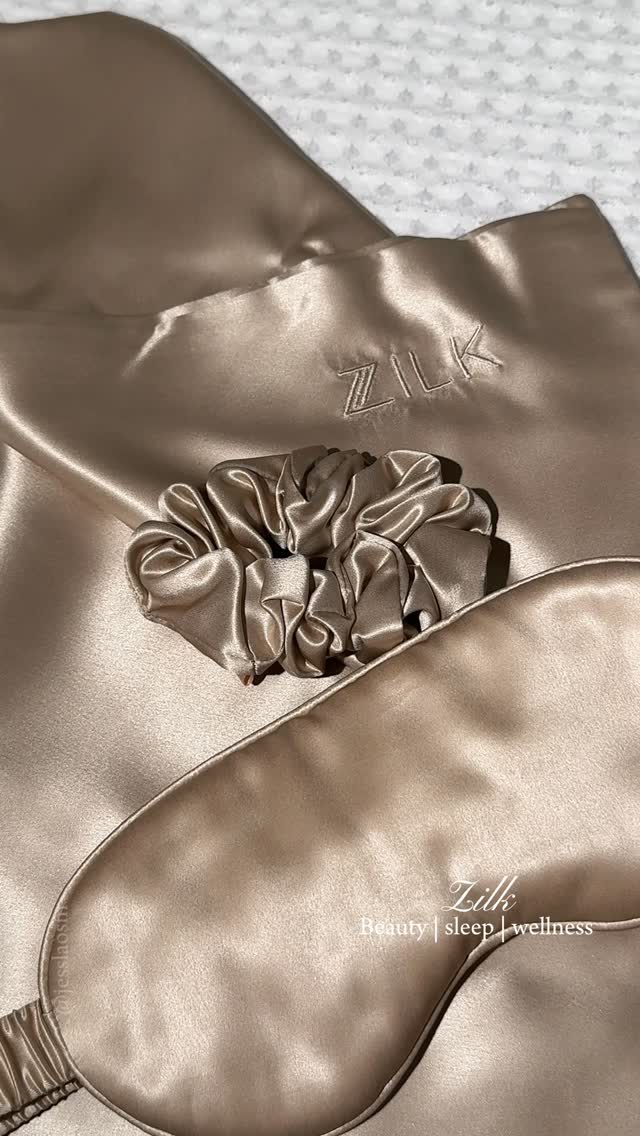 Taupe silk scrunchie on ZILK pillowcase