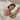 ZILK silk pillowcase in Champagne offers a calming surface for restful sleep. A woman peacefully rests her head on it.