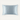 Light blue ZILK silk pillowcase on a cream background