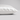 A close-up of a pillowcase in white silk, showing its smooth texture and hidden zipper detail, set against a neutral light gray background.